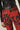 Pantalón cremalleras estampado grafitti rojo